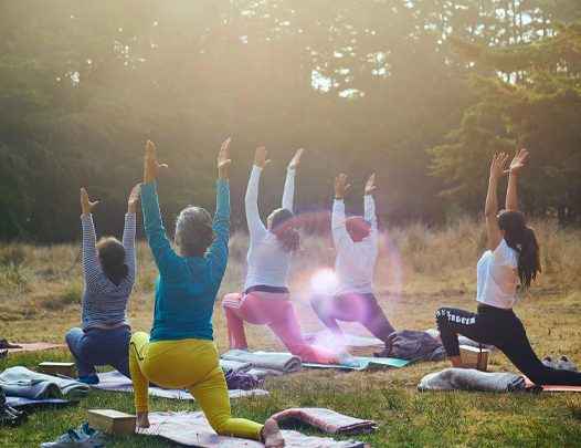 A group of women stretching outdoors